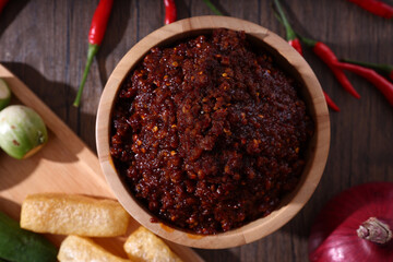 pork shrimp chilli dip local thai food sauce isolated in wood background