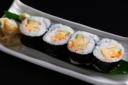 Futomaki maki rolls Japanese food isolate in black background