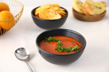 salad tomato soup and chips in black bowl healthy eating, healthy lifestyle