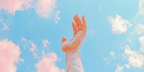 Reaching for the sky a human hand against a bright blue and pink cloudy background artistic representation of hope outdoor setting high angle view