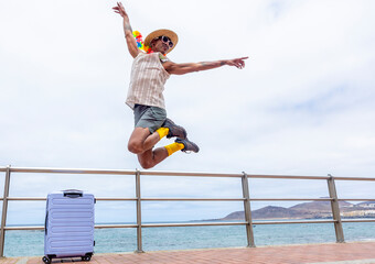 LGBTQIA+ person joyfully preparing for travel and holidays