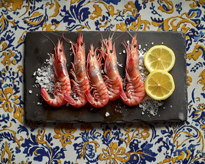 Delicious Fresh Sicilian Red Shrimp Garnished with Lemons on a Beautiful Stone Plate Presentation