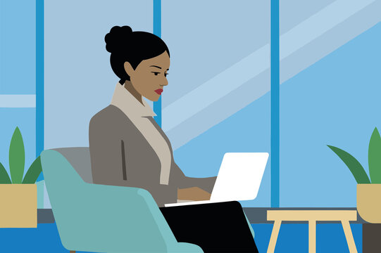 A businesswoman concentrates on her laptop while seated in a stylish chair in a bright office space with large windows. Green plants enhance the atmosphere