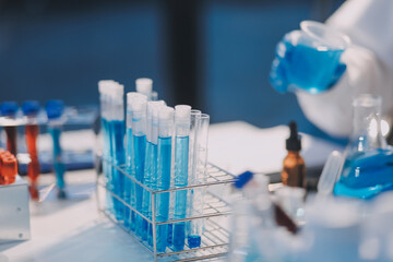 Microbiological research with a test tube and micropipette in close -up
