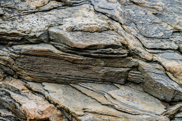 close-up view of layered sedimentary rock formation.