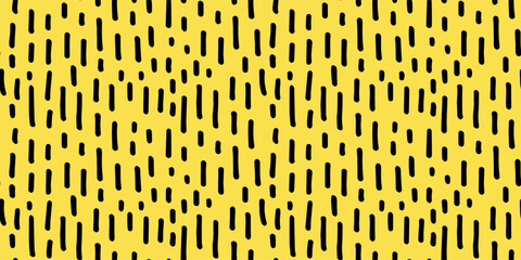 Hand drawn seamless black and yellow doodle pattern with irregular dashes. Playful and modern design, perfect for textiles, packaging, wallpapers, and branding projects. Vector illustration