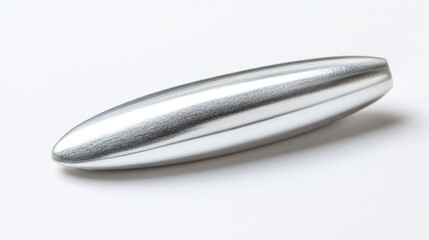 Polished silver metal object, oblong shape, smooth surface, studio shot.