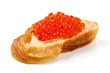 Red caviar on a crispy bread slice, isolated on white background.