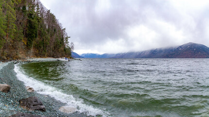 Panorama of  the Teletskoye lake shore in stormy autumn weather, Altai, Siberia, Russia, October
