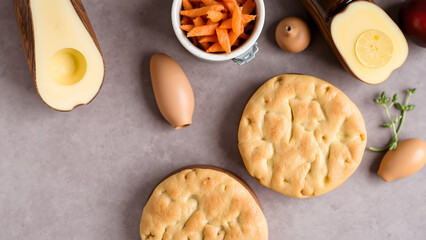Flatlay of Two Delicious Savory Cakes with Cheese, Carrots, and Eggs