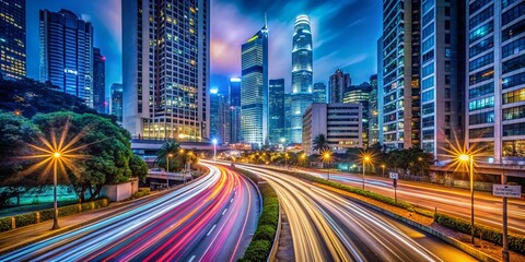 Fototapeta premium Hong Kong Night Cityscape: Traffic Tail Lights & Urban Glow