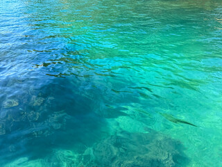 Mediterranean sea clear emerald water surface.