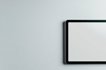 modern minimalistic workspace featuring clean tablet with educational interface soft white background