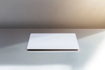 modern blank credit card staged on metallic surface with intricate reflections studio spotlight