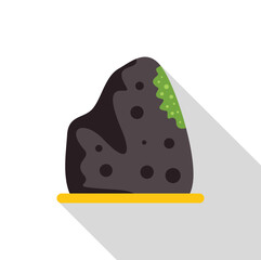 Dark gray porous volcanic rock partially covered with growing green moss on yellow ground