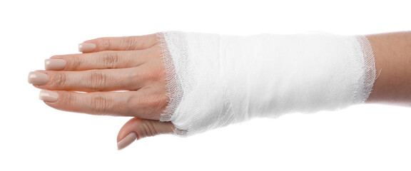 Woman with medical bandage on wrist against white background, closeup