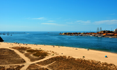 beach in ferragudo behind portimao algarve portugal