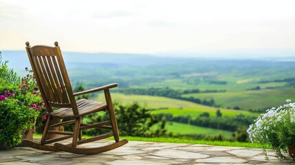 Serene rocking chair on a patio overlooking lush green hills and a tranquil valley landscape