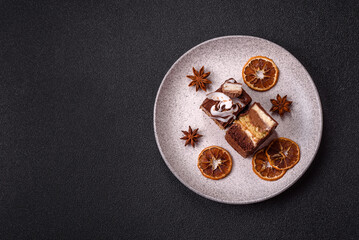 Piece of sweet chocolate bounty cake with coconut flakes and sponge