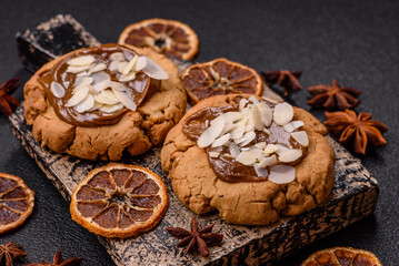 Round cookies with nuts and chocolate butter