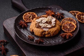 Round cookies with nuts and chocolate butter