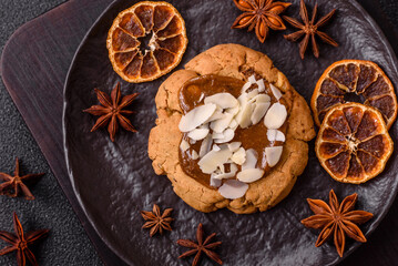Round cookies with nuts and chocolate butter