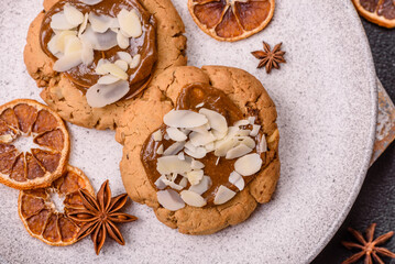 Round cookies with nuts and chocolate butter