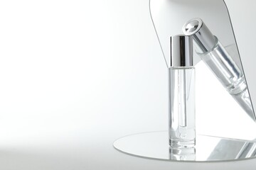 Stylish presentation of serum on light background, space for text