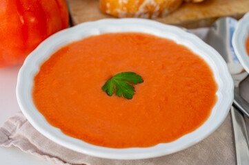 Famous vegetables soup from Cordoba, Andalusia salmorejo served cold in restaurant for lunch as starter dish close up