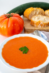 Famous vegetables soup from Cordoba, Andalusia salmorejo served cold in restaurant for lunch as starter dish close up