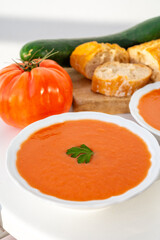 Famous vegetables soup from Cordoba, Andalusia salmorejo served cold in restaurant for lunch as starter dish close up