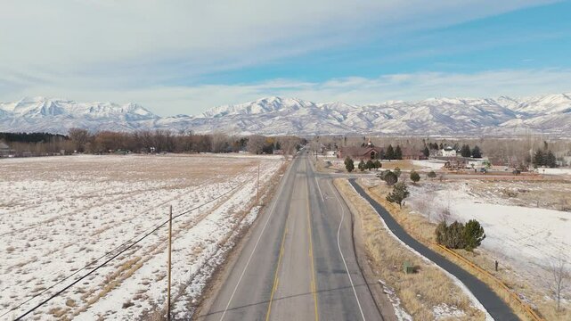 Heber Valley mormon SDL temple build site flying along road towards Wasatch Mount Timpanogos Heber City, Utah