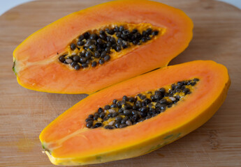 Ripe sweet tropical papaya fruits ready to eat, exotic food