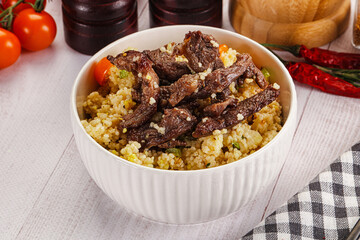 Traditional couscous with beef and vegetables