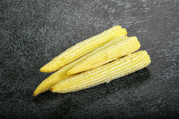 Raw sweet baby corn heap