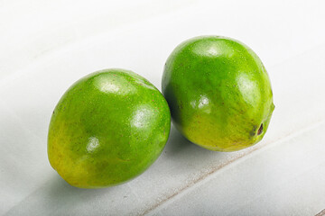 Two ripe green exotic avocado fruit