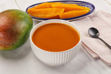 Sweet mango puree in the bowl