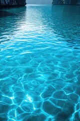 Obraz premium A serene lake with clear blue waters, surrounded by rock cliffs and islands.