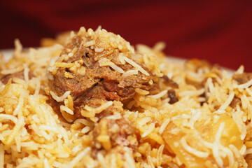 Savory rice dish with tender meat and spices enjoyed