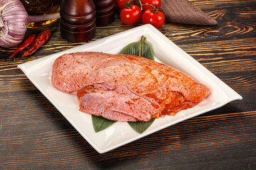 Raw marinated duck breast for cooking