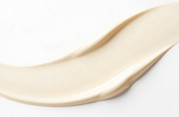A smear of cream on a white background. Texture of a cosmetic product.