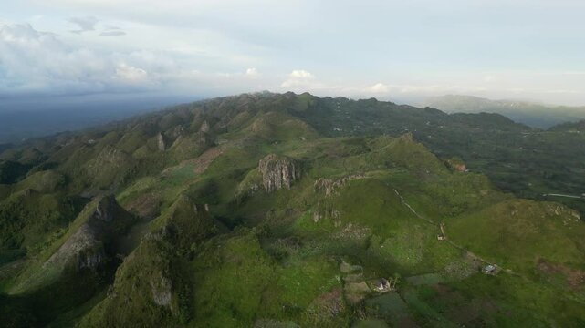 Sweeping aerial overviews of Ome&ntilde;a Peak, its natural beauty and stunning island panorama