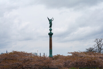 Fototapeta premium a small beautiful status of mermaids on the coast in Copenhagen