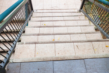 Old stone staircase at building office or home,Stairs, old Stairs near park and green grass,modern staircase,upper and under,retro or vintage style,space for text.