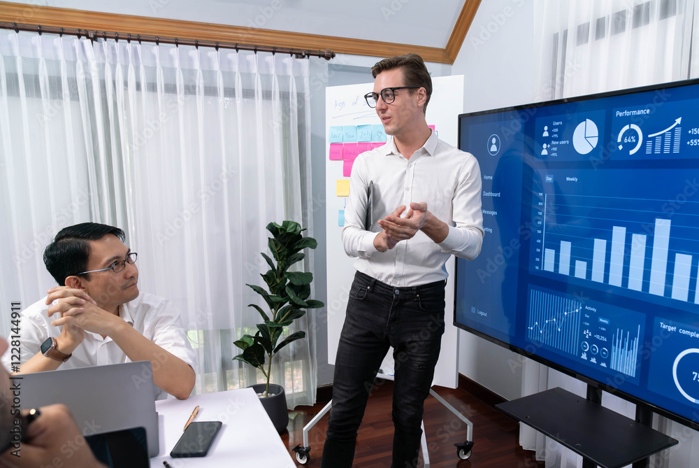 Poster presentation in office or meeting room with analyst team utilizing bi fintech to analyze financial d