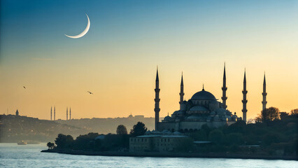 Fototapeta premium blue mosque at sunset,ramadan,istanbul,turkye,Majestic Mosque Silhouette at Sunset with Crescent Moon