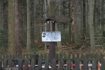 cross in forest