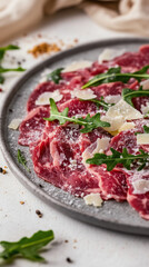 Exquisite beef carpaccio garnished with arugula, parmesan shavings, and edible flowers, captured in a macro shot with natural lighting