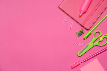 Different stationery on pink background, flat lay. Space for text