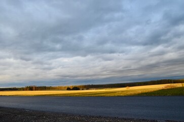 landscape cloudy sky over a field